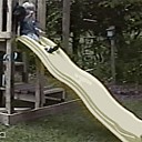 1331055411_girl_with_dog_on_a_slide